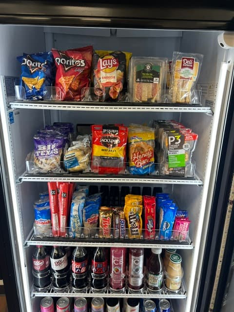 Close-up of a freshly stocked vending cooler
